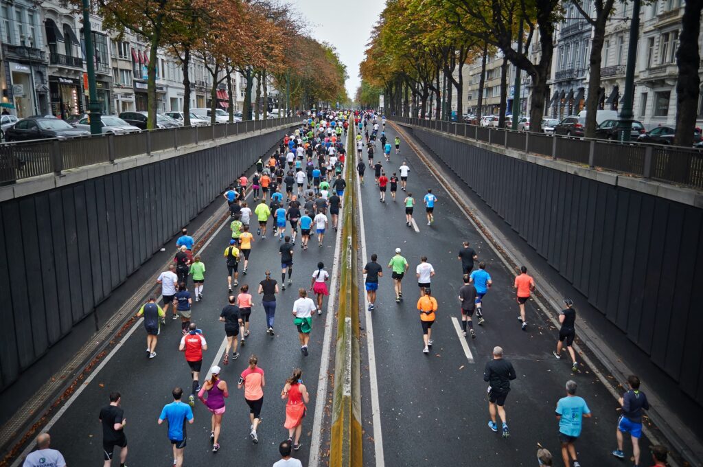 people running on road